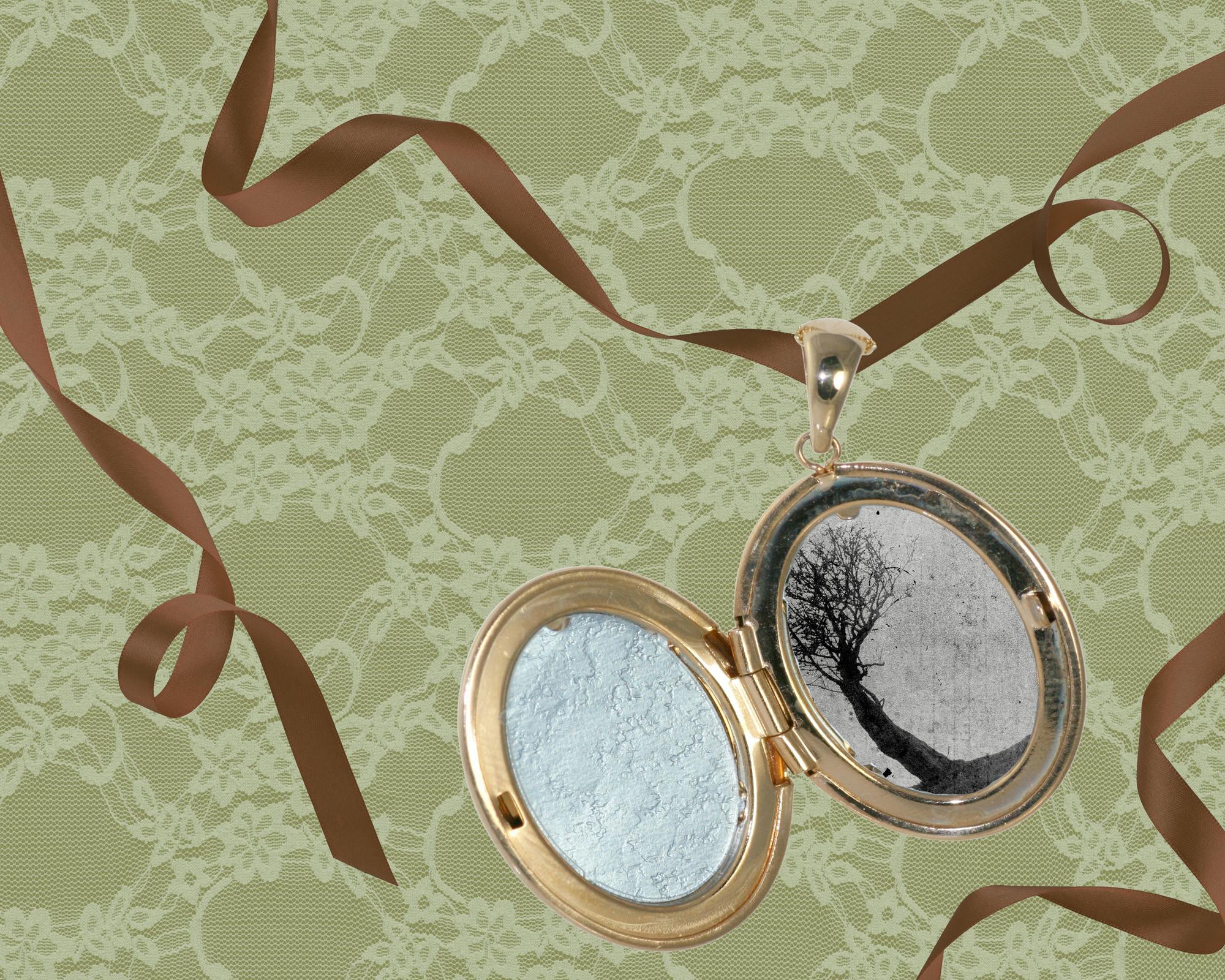 An open locket features a black-and-white image of a tree, set against a lace-covered green background with bronze ribbons.