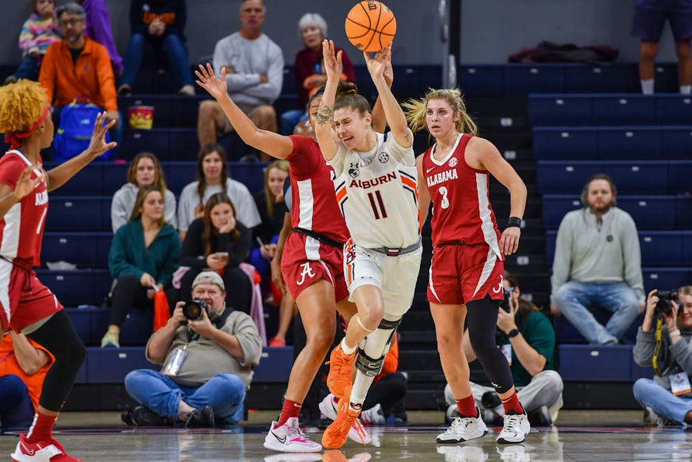 Romi Levy (#11) loses possesion of the ball in match of Auburn and Alabama at Neville Arena on January 8th 2023