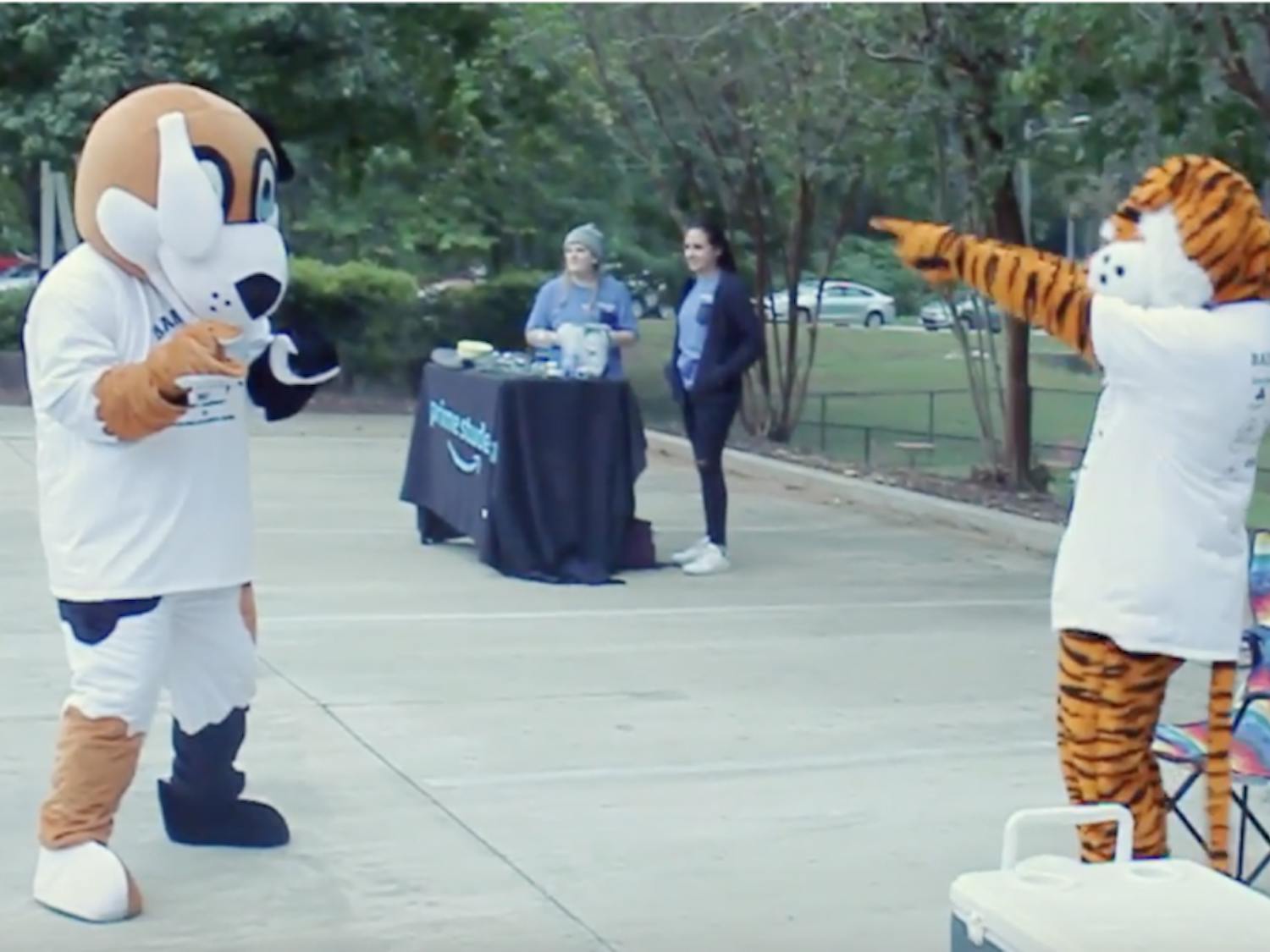 Still&nbsp;from video of Aubie facing off against a pup at the Lee County Humane Society's kickoff of the 2017 Pup Bowl on Nov. 1, 2017, in Auburn, Ala.&nbsp;