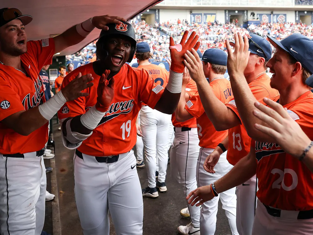 BIRMINGHAM, AL - MAY 23 - Auburn's Bub Terrell (19) celebrates hitting a home run - (6) Auburn Tigers vs. (7) Arkansas Razorbacks in the semifinals of the SEC Tournament at the Hoover Metropolitan Complex in Birmingham, AL on Saturday, May 23, 2026. Photo by Zach Bland/Auburn Tigers