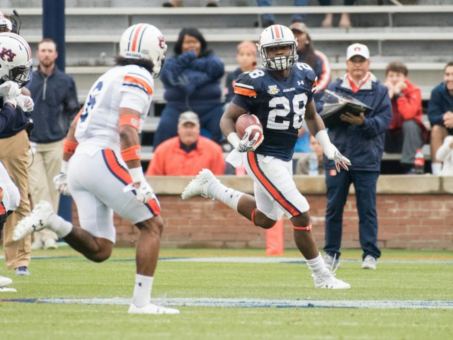 JaTarvious Whitlow (28) runs downfield during Auburn's A-Day game on Saturday, April 7, 2018, in Auburn, Ala.