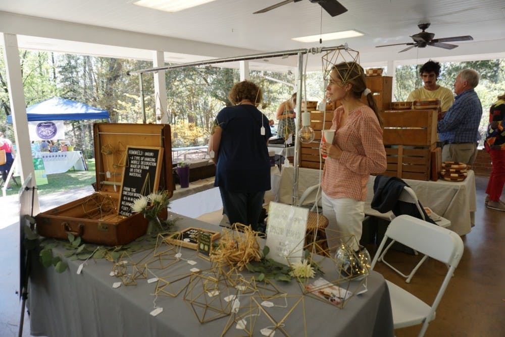 Local vendors sell work under the pavilion at Auburn University's&nbsp;Donald E. Davis Arboretum on Saturday, March 31, 2018, in Auburn, Ala.