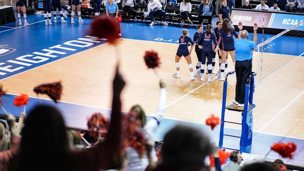 <p>Auburn volleyball celebrates during their match against Houston in the second round of the 2022 NCAA Tournament.&nbsp;</p>