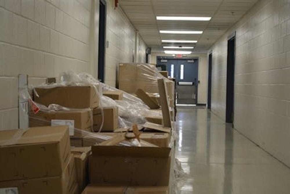 Boxes share the hallways with the economics department. (Kris Sims | Multimedia Editor)
