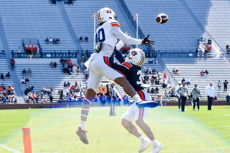 Landen King (40) mosses a defender in the end zone for a touchdown during the 2022 A-Day game in Jordan-Hare Stadium in Auburn, Alabama, on April 9, 2022.
