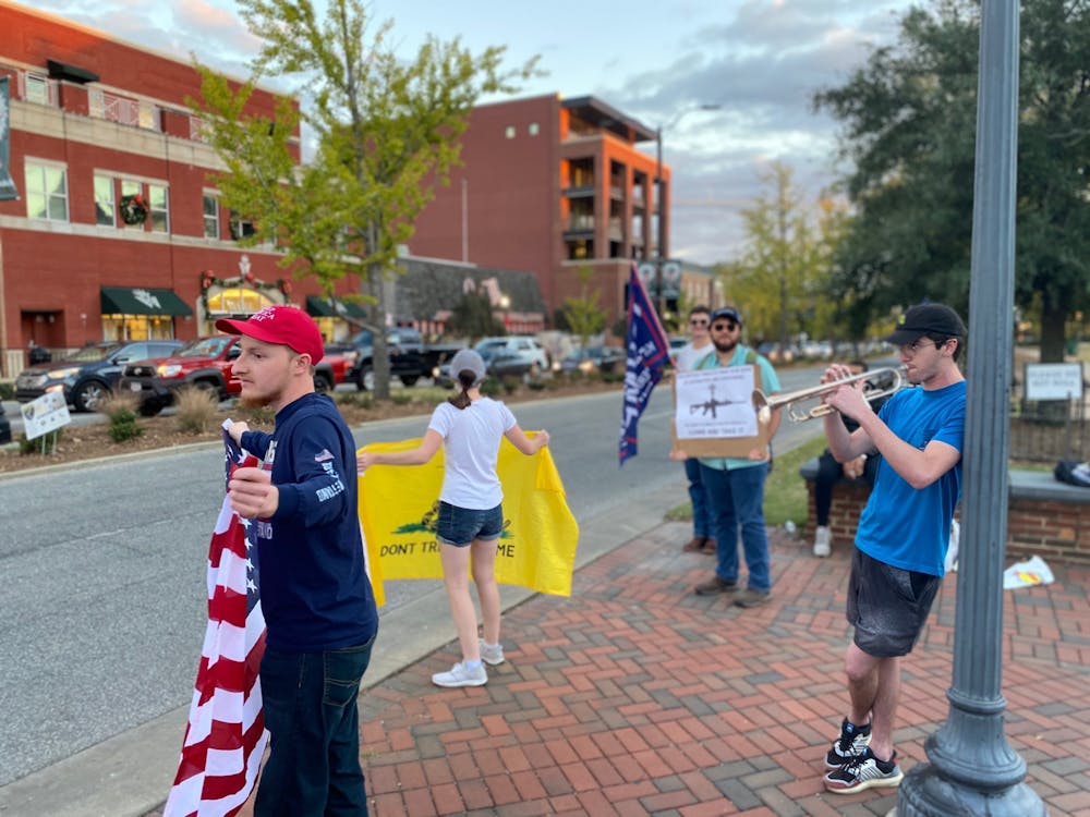 Student gathered at Toomer's Corner for the Freedom Rally to support President Trump through what they allege is voter fraud in the 2020 presidential election.