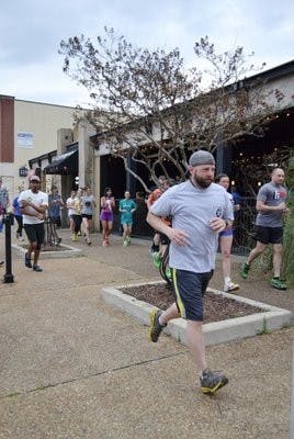 Runners met at Quixote's and celebrated with a couple of beers. (Raye May / PHOTO EDITOR)