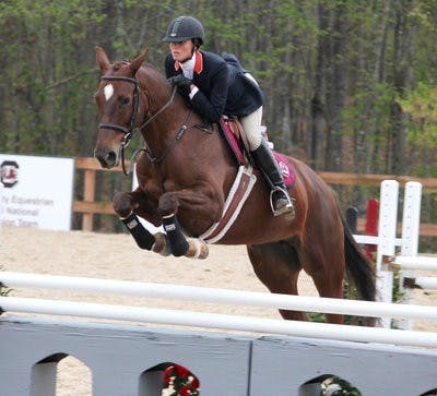Junior Grace Socha clears a fence during the Tigers' SEC Championship win in South Carolina. (Contributed)