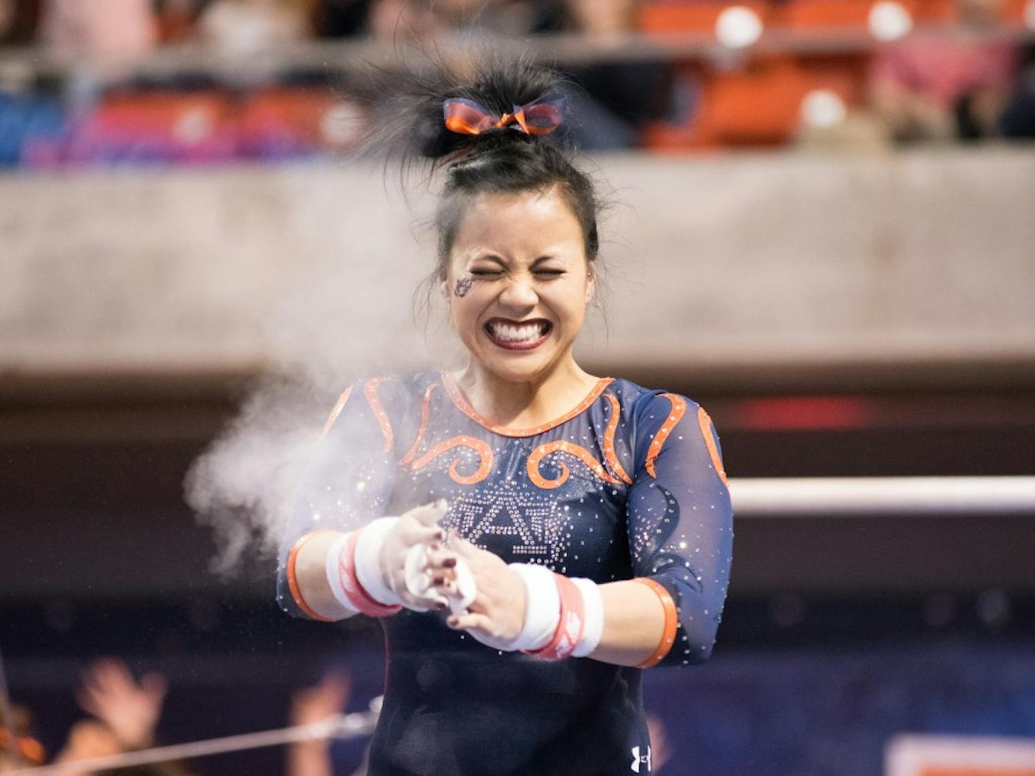 Samantha Cerio reacts after her uneven bars routine&nbsp;at Auburn Gymnastics vs. Kentucky at Auburn Arena in Auburn, Ala. on Friday, Jan. 26, 2018.
