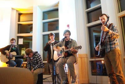 John and the Conners perform an original song at UPC's Open Mic Night Thursday at the AUSC Starbucks. (Derek Lacey / Associate campus editor)