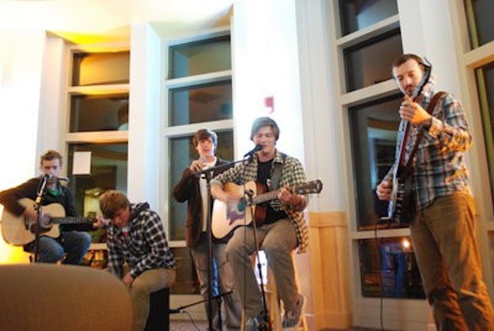 John and the Conners perform an original song at UPC's Open Mic Night Thursday at the AUSC Starbucks. (Derek Lacey / Associate campus editor)