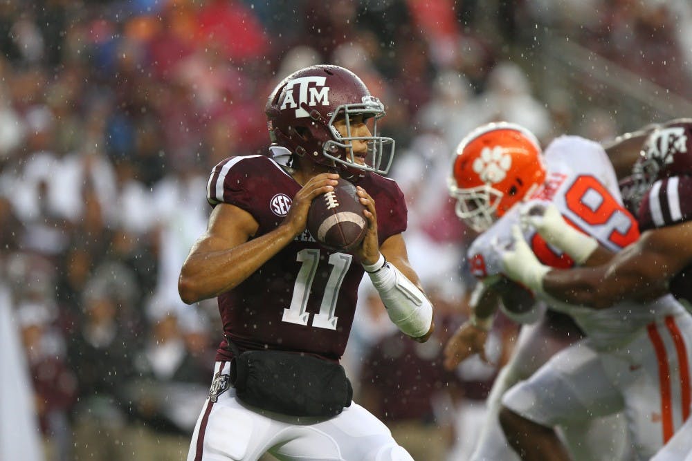 <p>Kellen Mond (11) looks to pass during Texas A&amp;M vs. Clemson on Sept. 8, 2018, in College Station, Texas. Photo courtesy of Jesse Everett / The Battalion</p>
