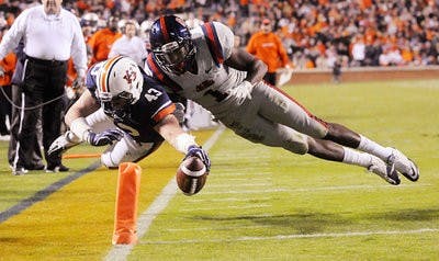Philip Lutzenkirchen dives for the end zone pylon in Auburn's game against Ole Miss in 2011.