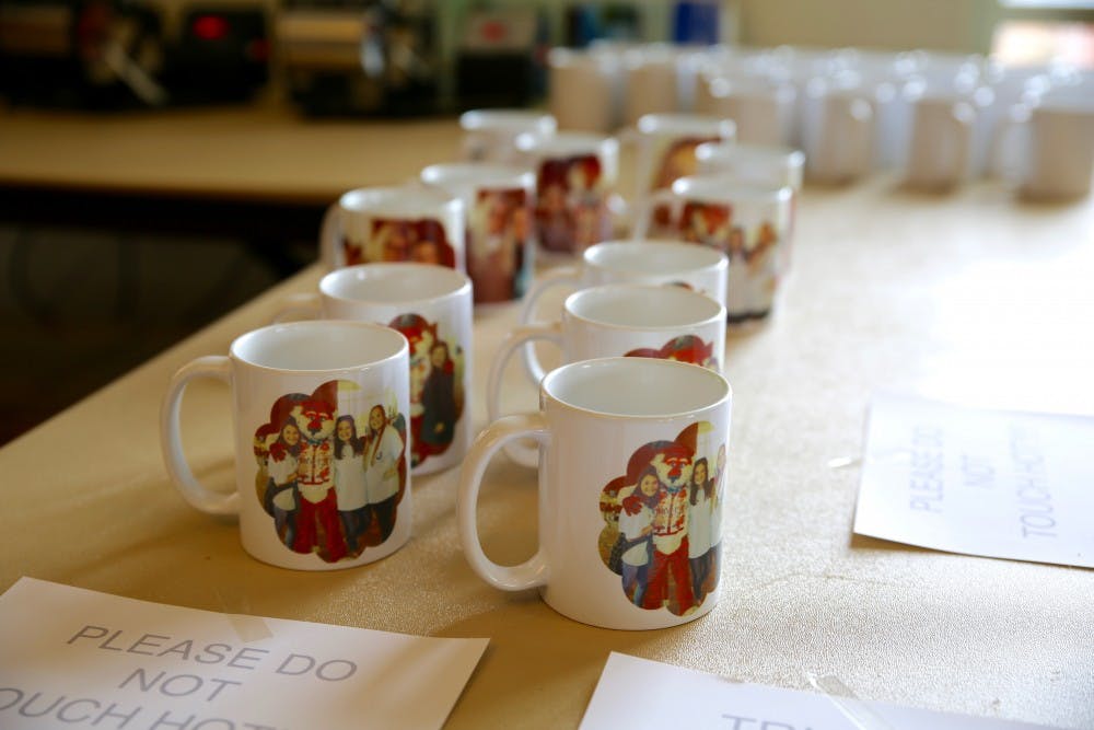 Personalized mugs are made for students&nbsp;during UPC annual Jingle Ball Jam in Student Center Ballroom on Nov. 30, 2016.