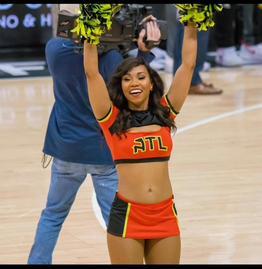 <p>Jennifer P., Auburn alumna, cheers for the Atlanta Hawks.&nbsp;</p>