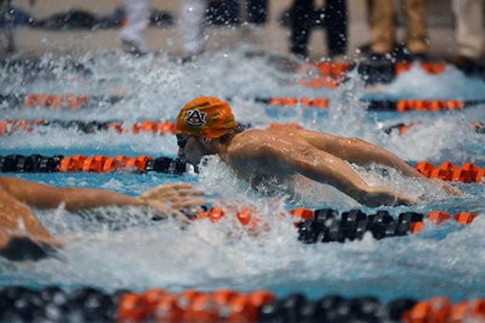 Alexander Hancock swims in the meet. (Emily Enfinger | Photo Editor)