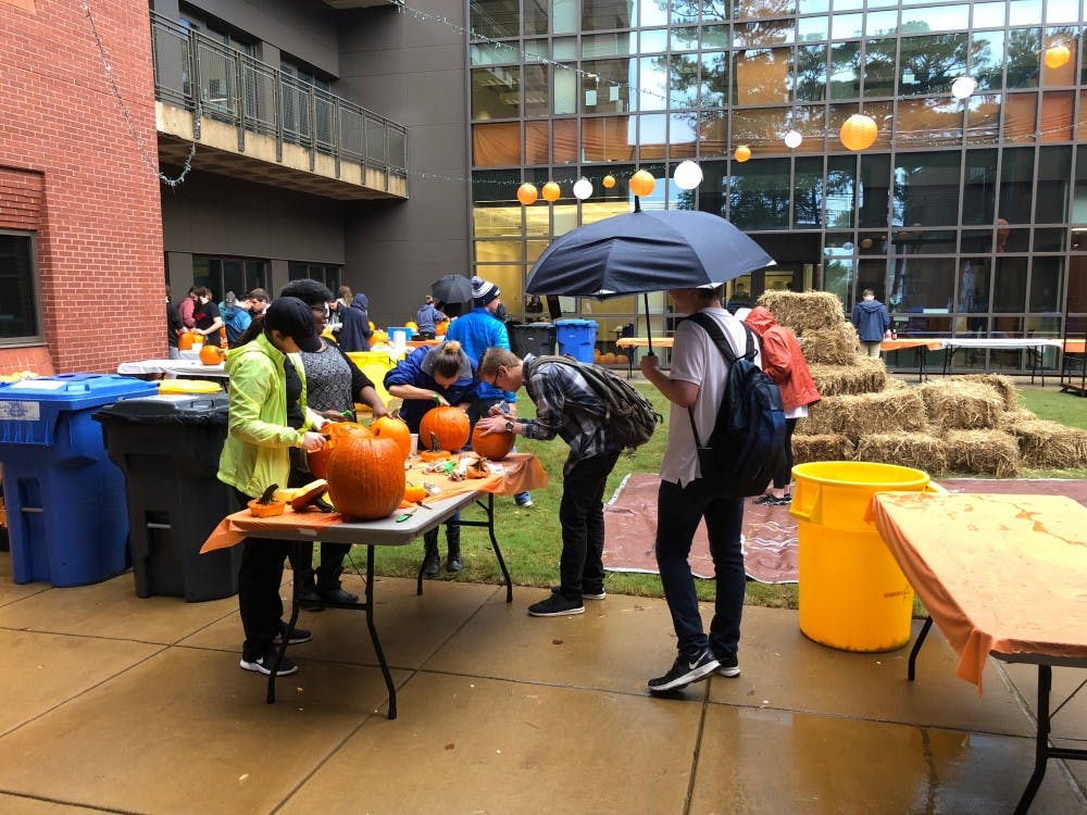 <p>CADC students carve pumpkins on Oct. 26 2018, in Auburn, Ala.</p>