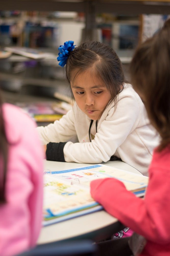 A student in the Esperanza program studies at the Auburn Public Library on Tuesday, March 20, 2018.