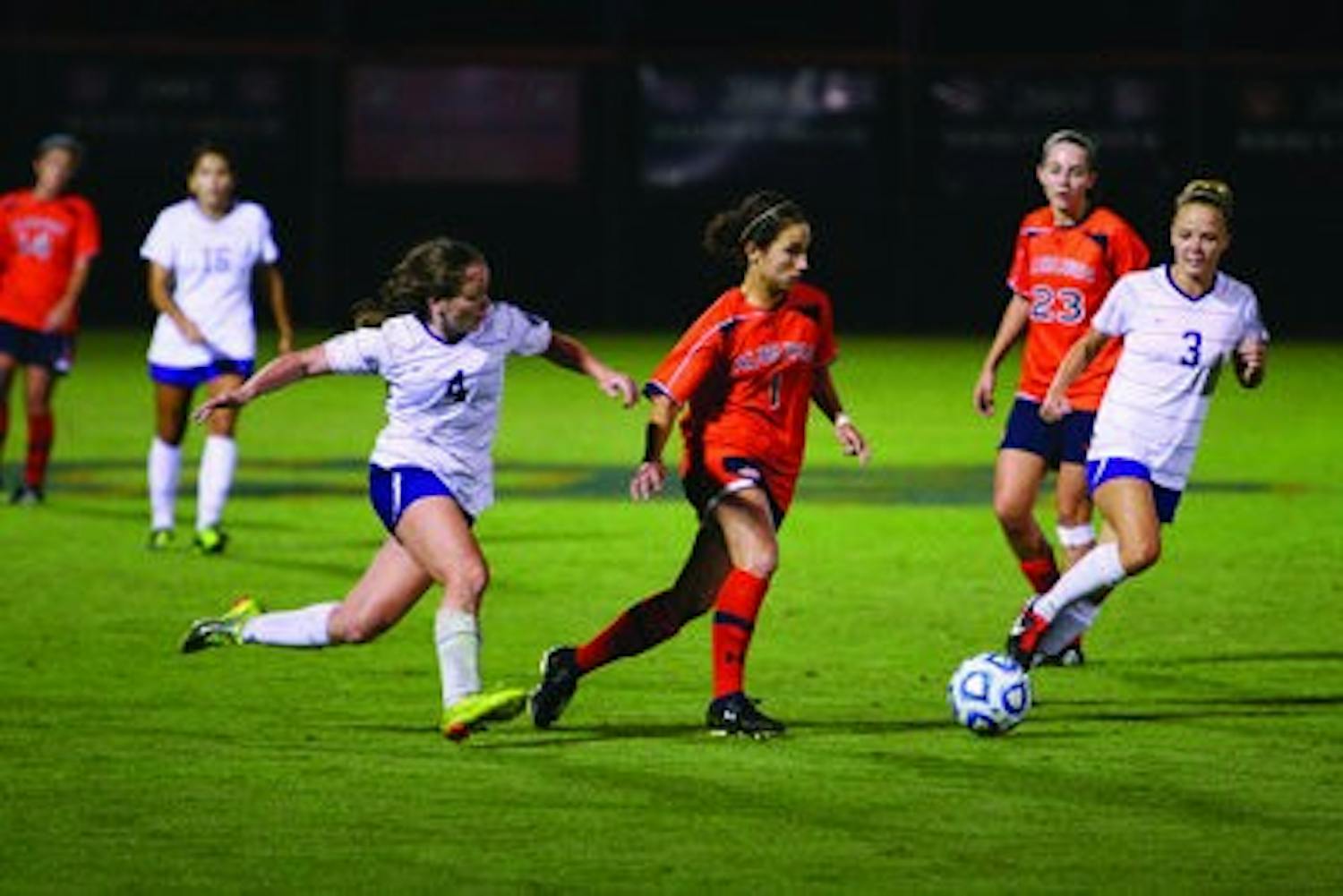 Junior midfielder Ana Cate sprints down the field, keeping possesion from LSU. (Rebecca Croomes / ASSISTANT PHOTO EDITOR)