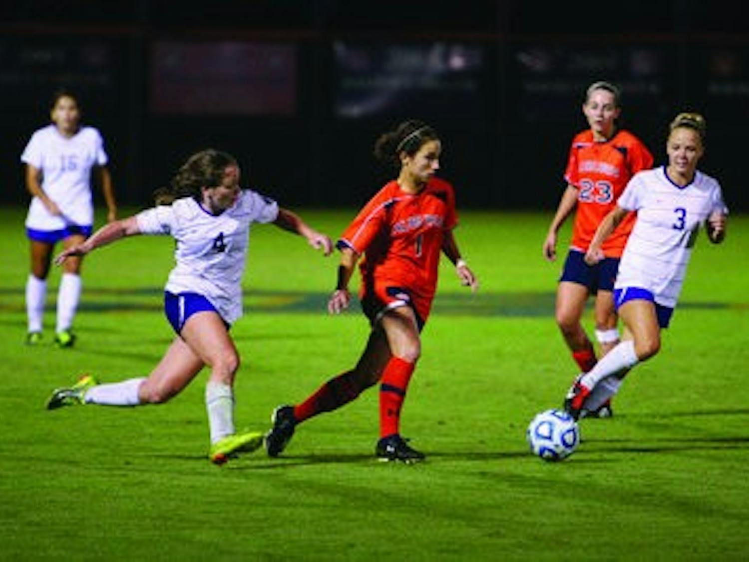 Junior midfielder Ana Cate sprints down the field, keeping possesion from LSU. (Rebecca Croomes / ASSISTANT PHOTO EDITOR)