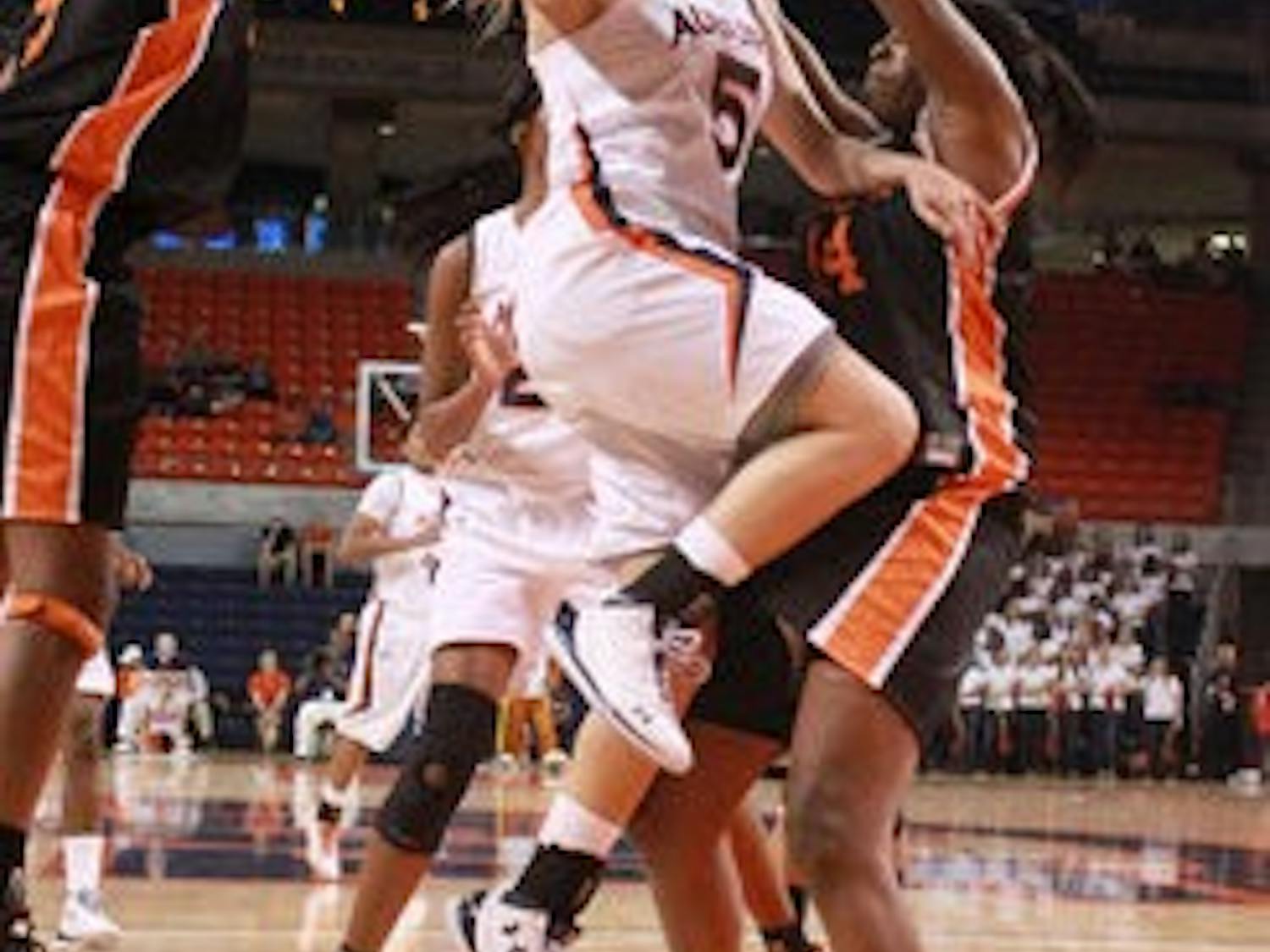 Senior guard Alli Smalley shoots the ball against Mercer Friday night. Auburn won 79-61. (Emily Adams / Photo Editor)