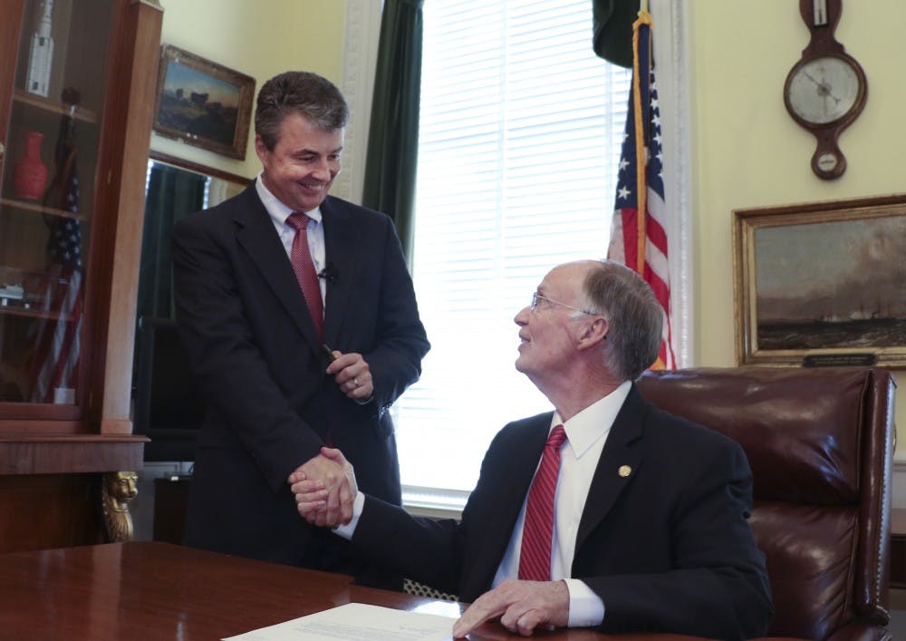 Gov. Robert Bentley shakes hands with new Alabama Attorney General Steve Marshall, after signing his appointment letter at the state Capitol in Montgomery, Friday, Feb. 10, 2017. Marshall has served as the district attorney in Marshall County in north Alabama, appointed to the post in 2001 and re-elected three times. He is a past president of the Alabama District Attorney's Association and currently serves as commission chairman of the Alabama Criminal Justice Information Center.(Governor's Office, Jamie Martin) 