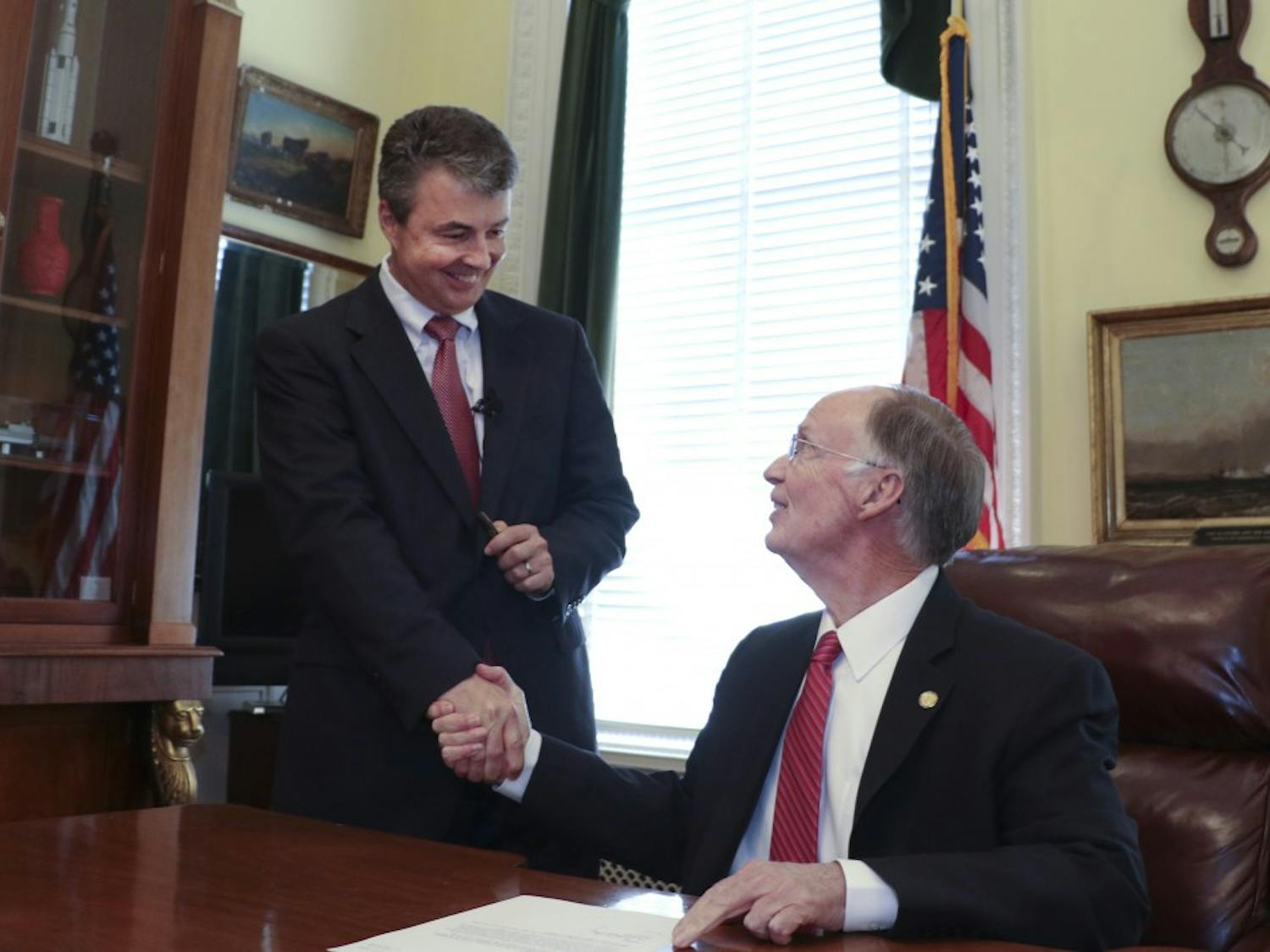 Gov. Robert Bentley shakes hands with new Alabama Attorney General Steve Marshall, after signing his appointment letter at the state Capitol in Montgomery, Friday, Feb. 10, 2017. Marshall has served as the district attorney in Marshall County in north Alabama, appointed to the post in 2001 and re-elected three times. He is a past president of the Alabama District Attorney's Association and currently serves as commission chairman of the Alabama Criminal Justice Information Center.(Governor's Office, Jamie Martin) 