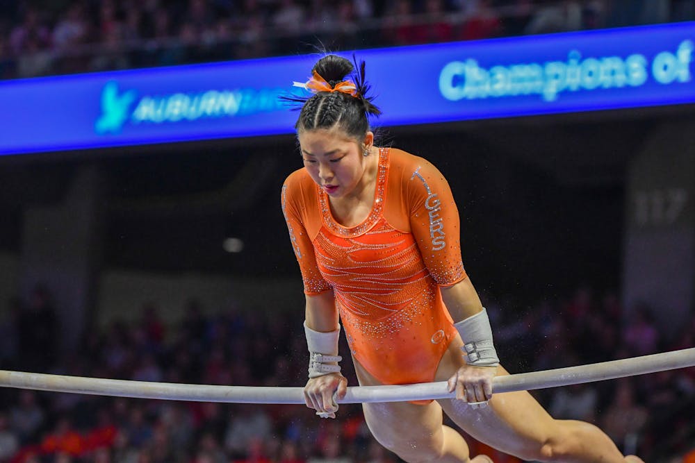 <p>Sophia Groth on Bars against LSU at Neville Arena on February 10 2023</p>