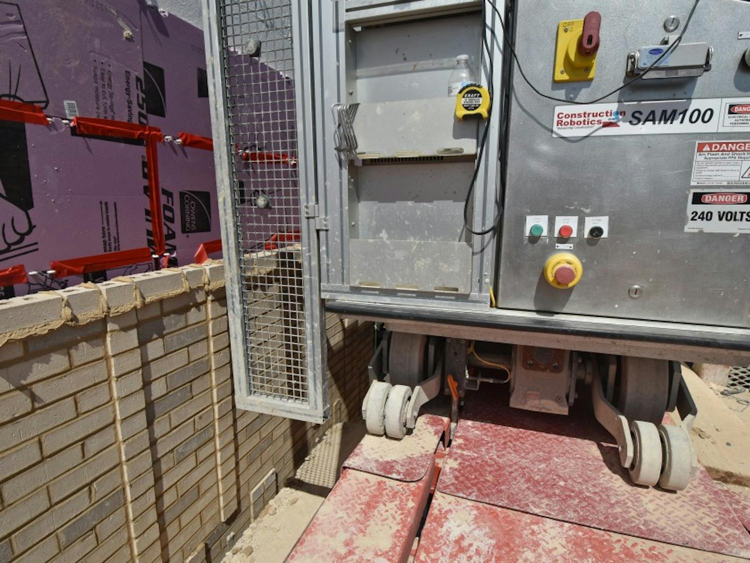 Construction Robotics SAM100 laying bricks at the Jay and Susie Gogue Performing Arts Center in Auburn, Ala. 
