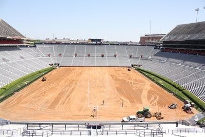 Pat Dye Field looks unrecognizable before workers lay new sod from Bent Oak Farms on the field. The project was completed Wednesday afternoon.