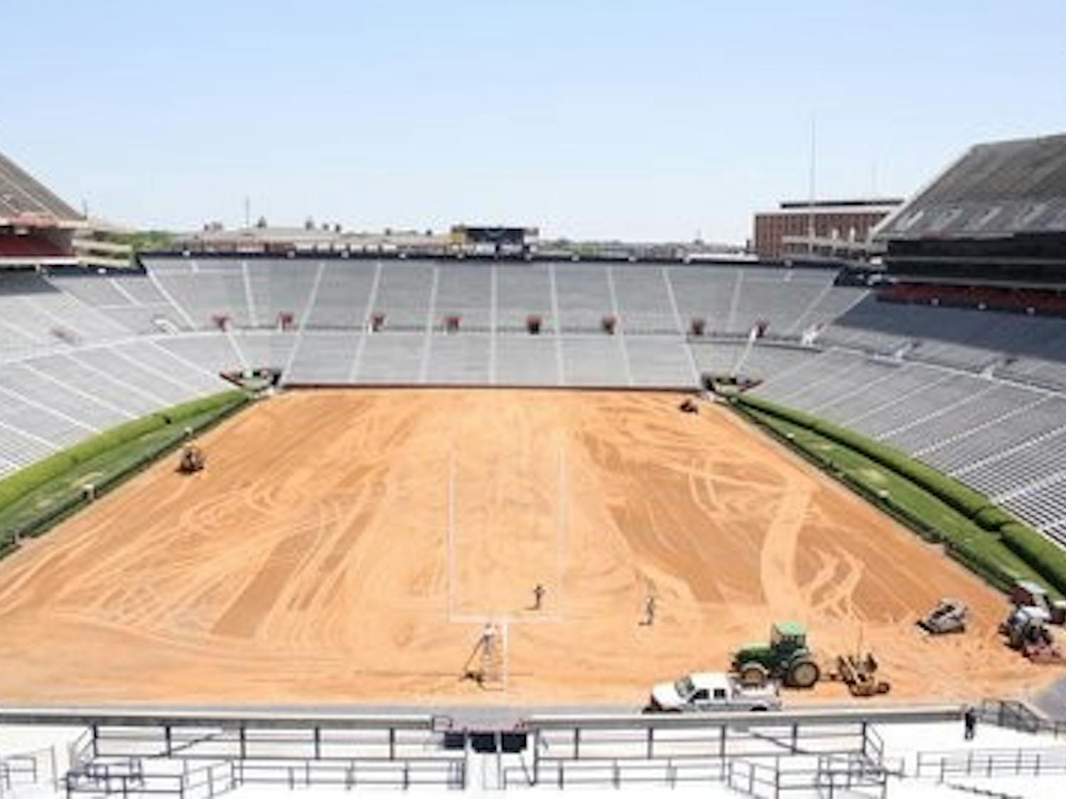 Pat Dye Field looks unrecognizable before workers lay new sod from Bent Oak Farms on the field. The project was completed Wednesday afternoon.