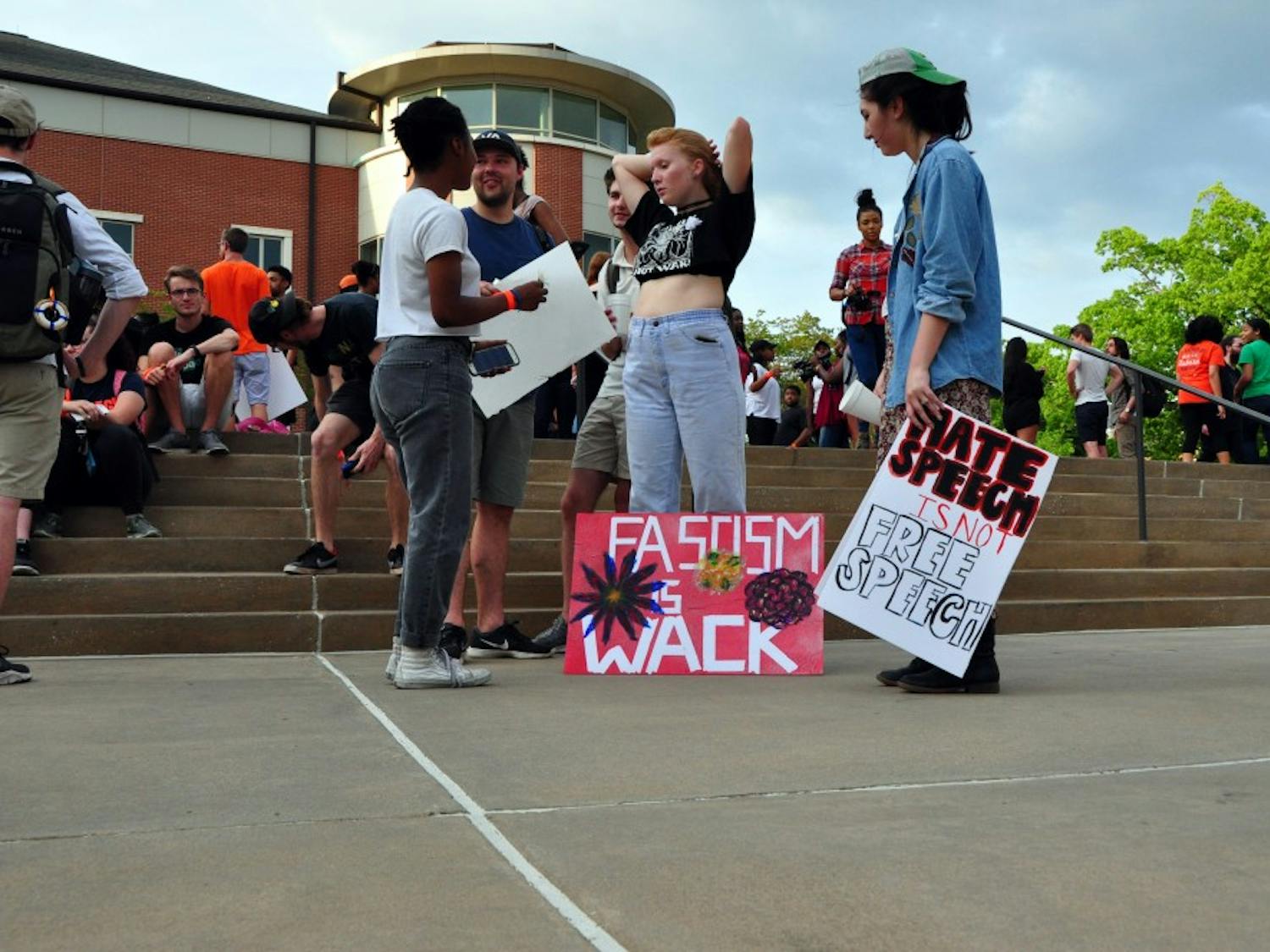 Students prepare to march down to the Green Space to protest Richard Spencer's visit on campus on Tuesday, April 18, 2017, in Auburn, Ala.