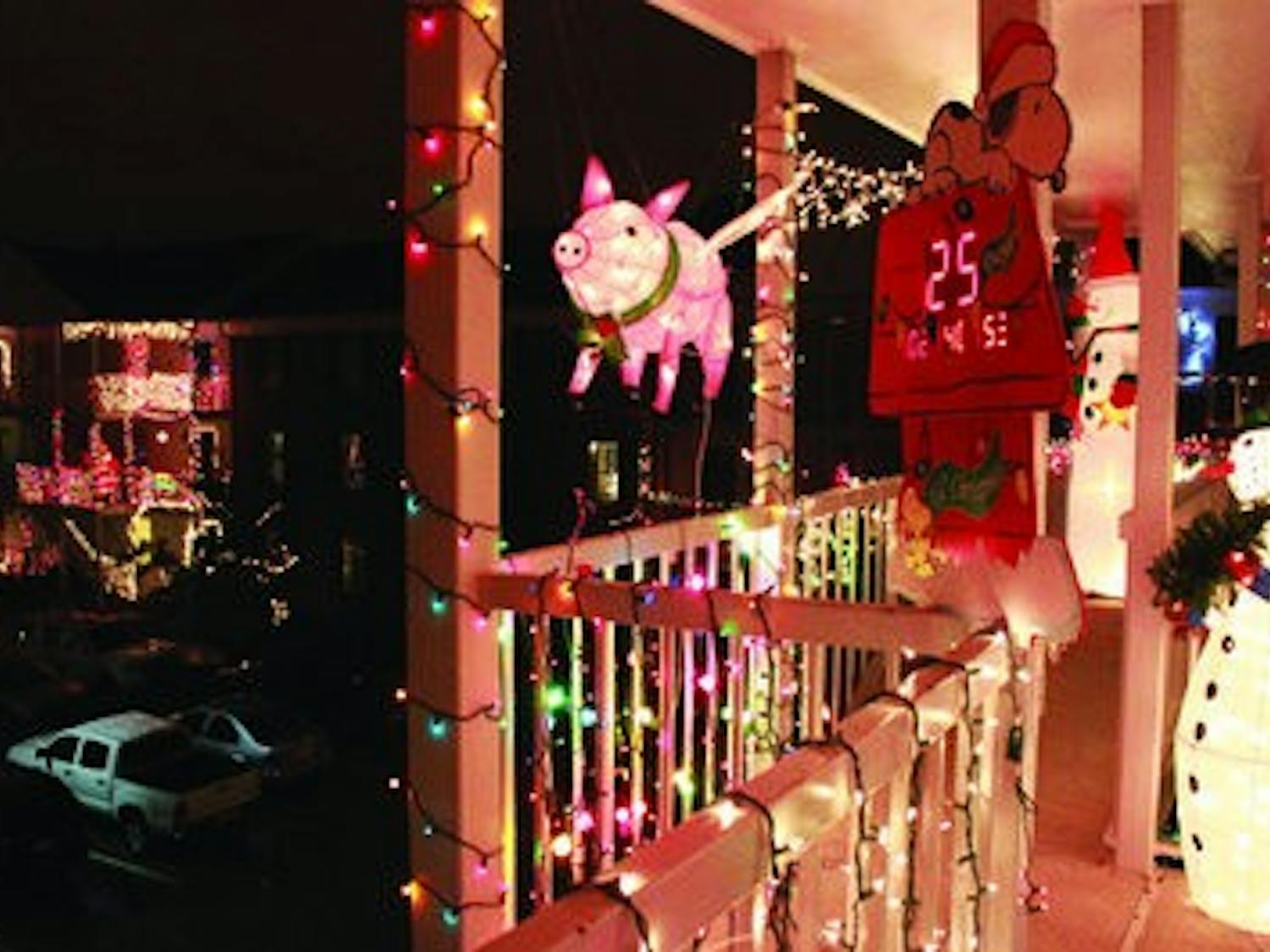 A flying pig and a snowman adorn the brightly-lit apartment 26 at University Corner. (Emily Adams / Photo Editor)