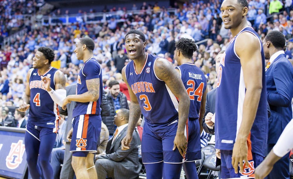 <p>Danjel Purifoy (3) cheers during Auburn basketball vs. North Carolina in the Midwest Region semifinal of the 2019 NCAA Tournament on March 29, 2019, in Kansas City, Mo. Photo courtesy Lauren Talkington / The Glomerata.&nbsp;</p>