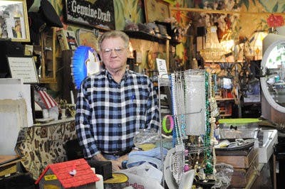 Owner of Roland's Thrift Store in downtown Opelika Roland Lee collects the items he sells from all over the Southeast. Items include clocks, Coca-Cola signs, pocket knives and instruments. (Christen Harned / ASSISTANT PHOTO EDITOR)