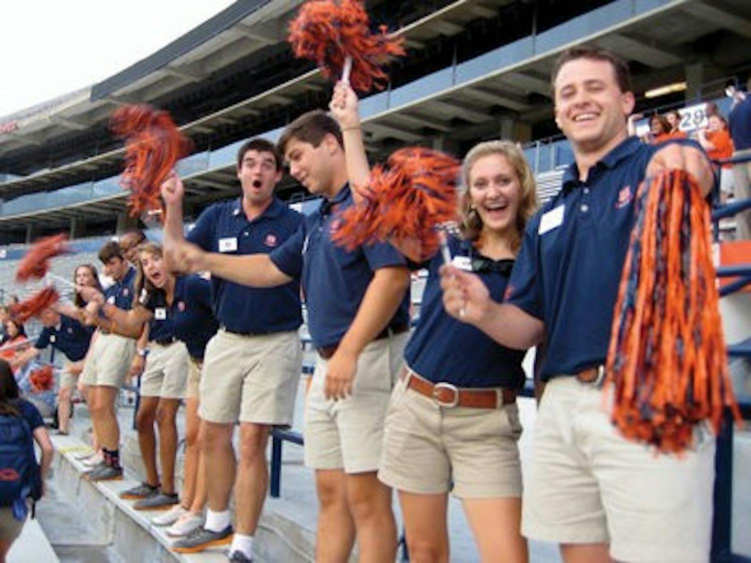 A group of 2013 Camp War Eagle counselors lead their freshmen in a cheer at a Jordan-Hare Stadium pep rally (Maddie Yerant | Writer)