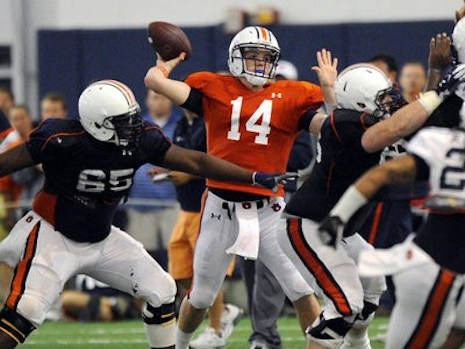 Auburn's Zeke Pike makes a throw in the team's first scrimmage Saturday. (Courtesy of Todd Van Emst)