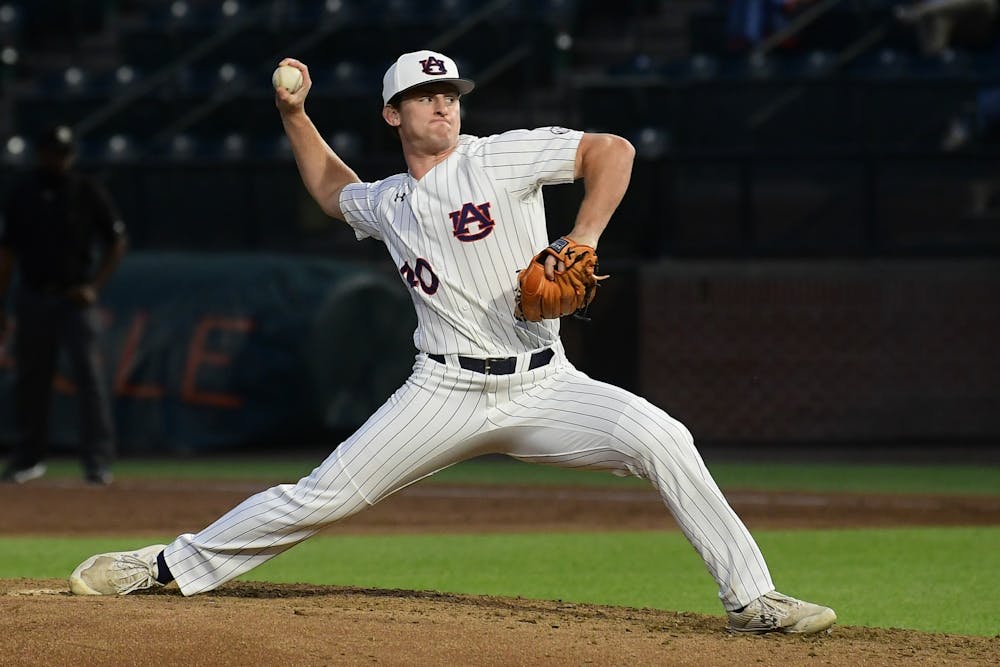 May 18, 2021; Auburn, AL, USA; Auburn Tigers pitcher Blake Burkhalter (40) delivers  during the game between Auburn and North Alabama at Plainsman Park. Mandatory Credit: Shanna Lockwood/AU Athletics