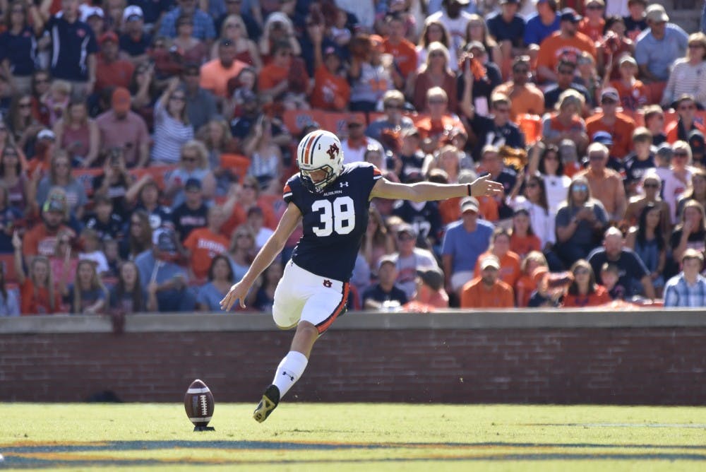 Daniel Carlson (38) kicks the ballduring the first half of a NCAA college football game, Saturday, Oct. 1, 2016, in Auburn, Ala.