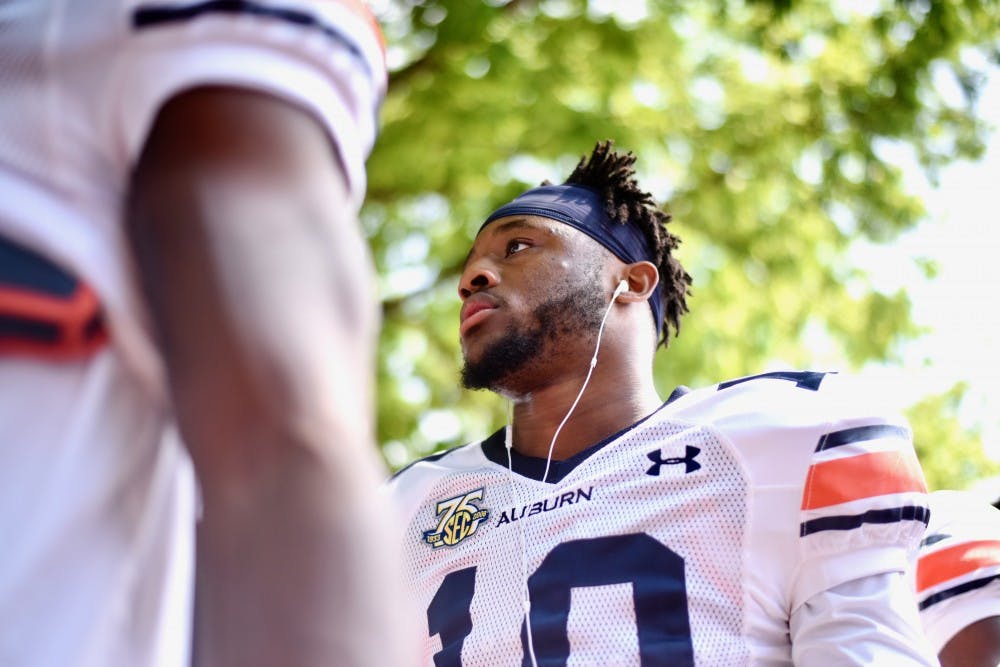 Owen Pappoe (10) during Tiger Walk before A-Day on Saturday, April 13, 2019, in Auburn, Ala.