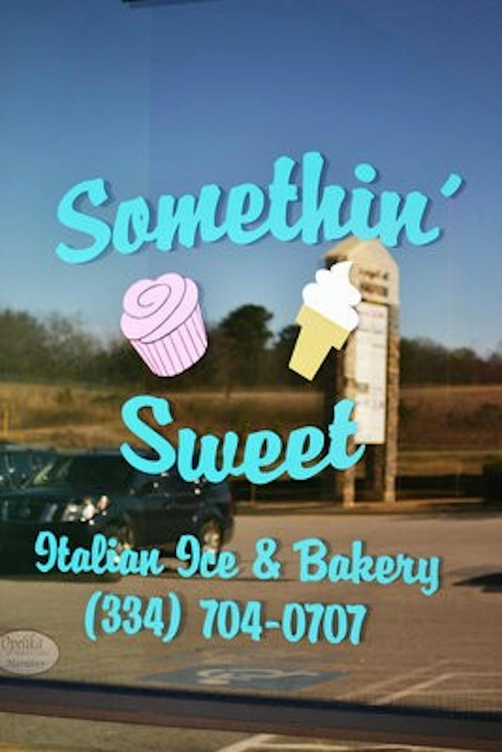 Jerrod and Kristy Woodham own Somethin' Sweet, where Kristy bakes everything by hand. (Raye May / PHOTO EDITOR)