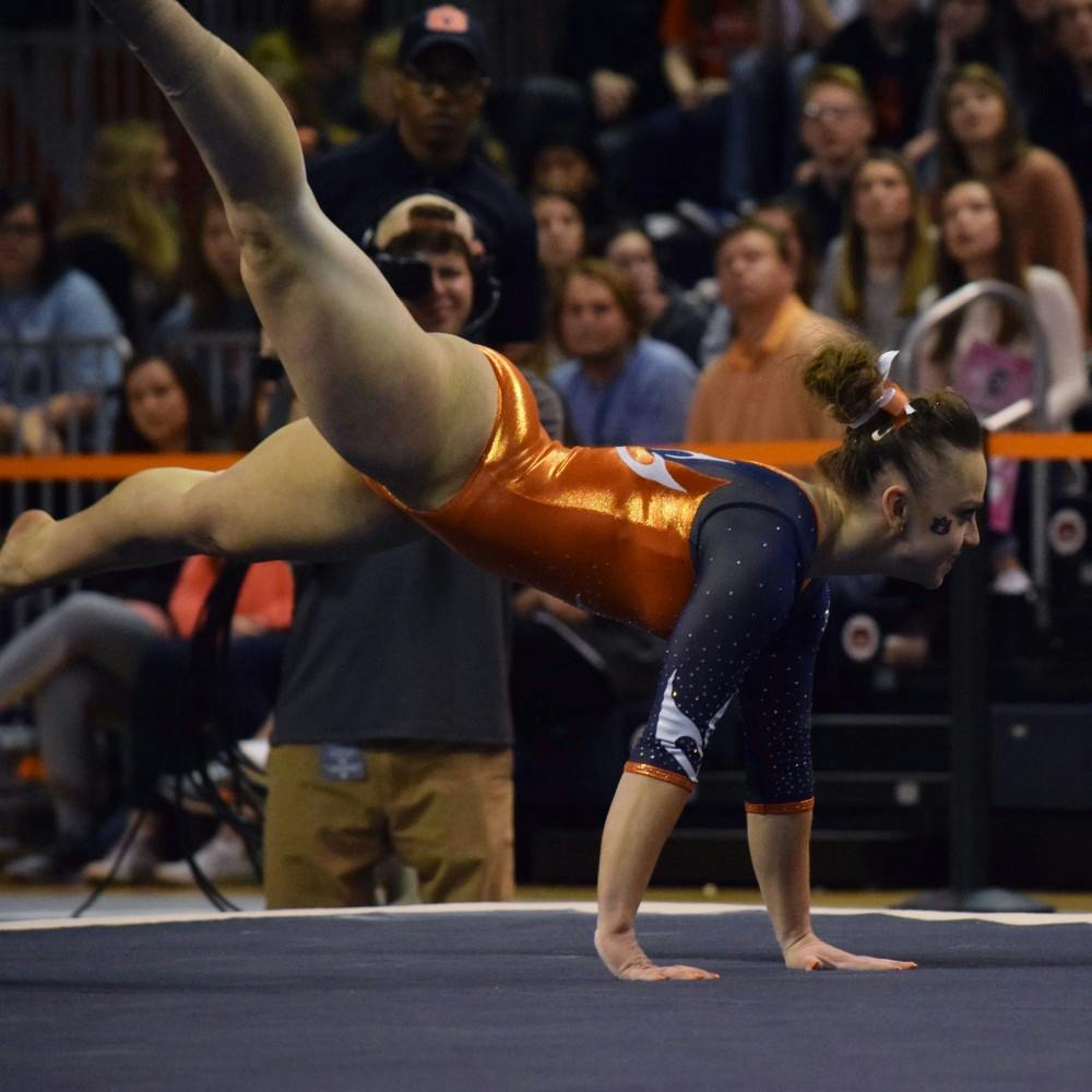 Caitlin Atkinson performs her floor routine.&nbsp;Alabama vs Auburn in Auburn, Ala. on Friday, Feb. 12, 2016.