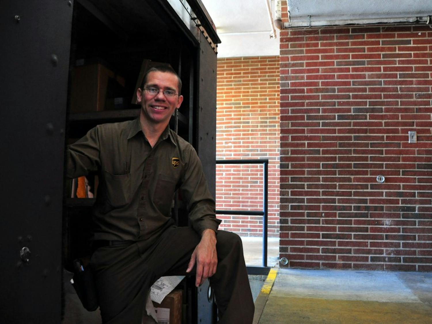 Richard Oden stands in a UPS truck at the Haley Center loading dock on Thursday, March 2, 2017, in Auburn, Ala.