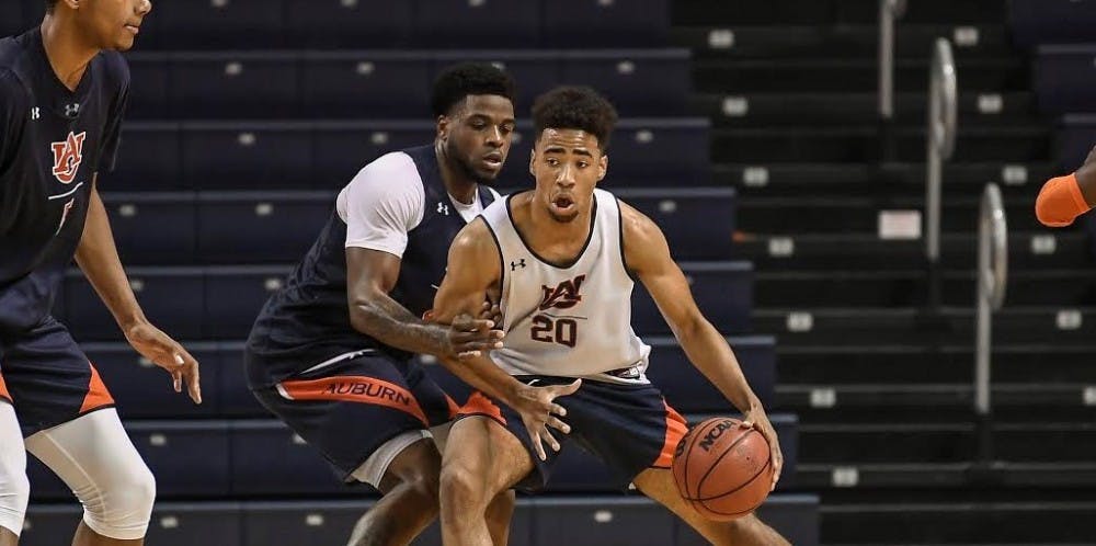 <p>Myles Parker (20) at Auburn basketball practice.</p>