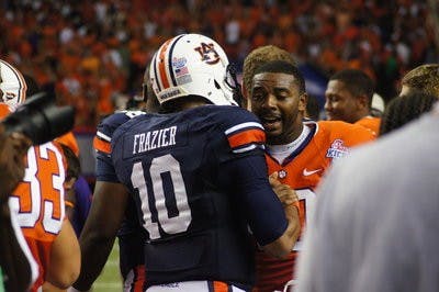 Frazier speaks with Clemson quarterback Tajh Boyd after Saturday's loss in Atlanta.  (Robert Lee / EDITOR-IN-CHIEF)