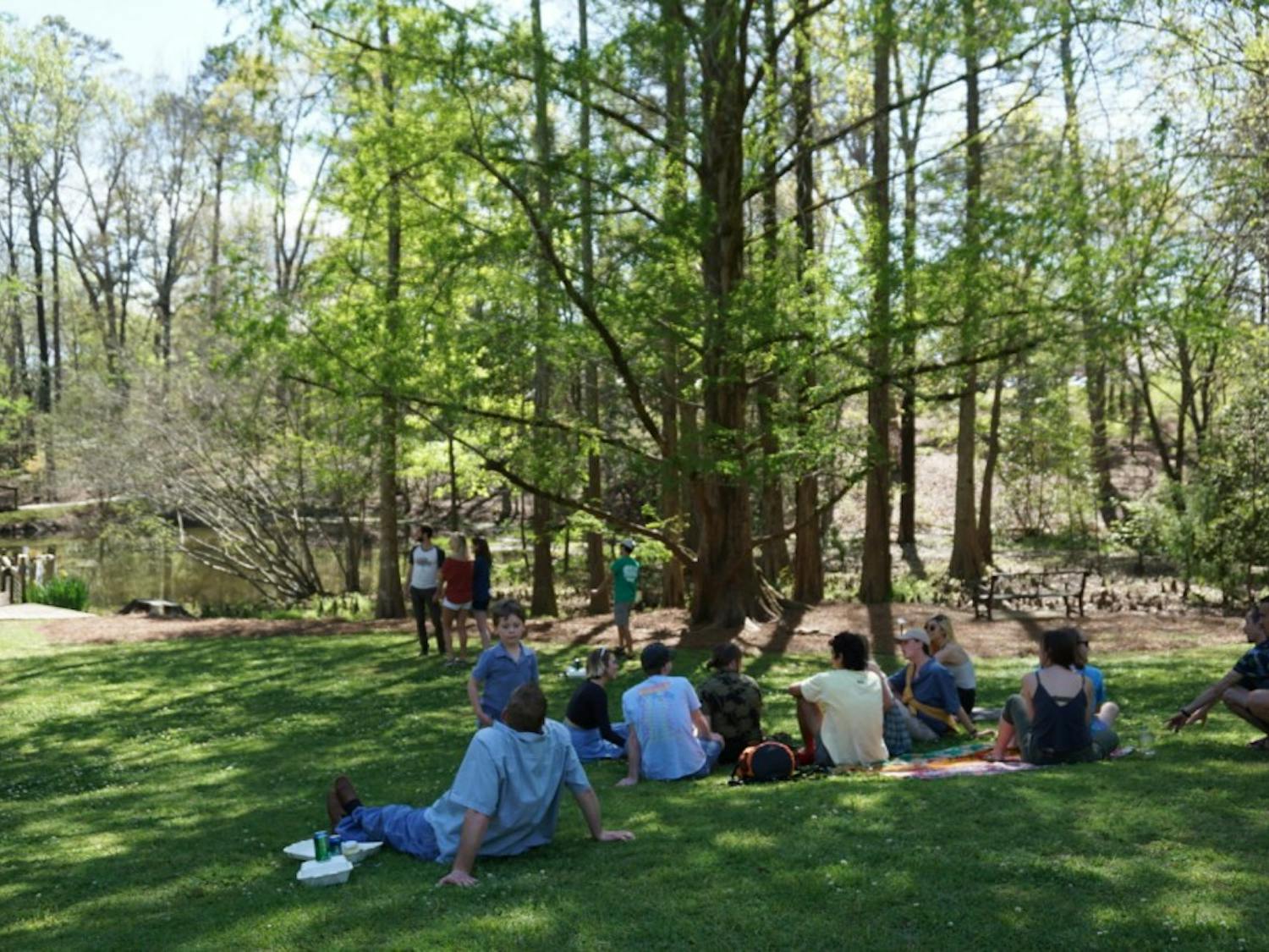 Attendees listen to live music during&nbsp;the Azalea Festival at Auburn University's Donald E. Davis Arboretum on Saturday, March 31, 2018, in Auburn, Ala.