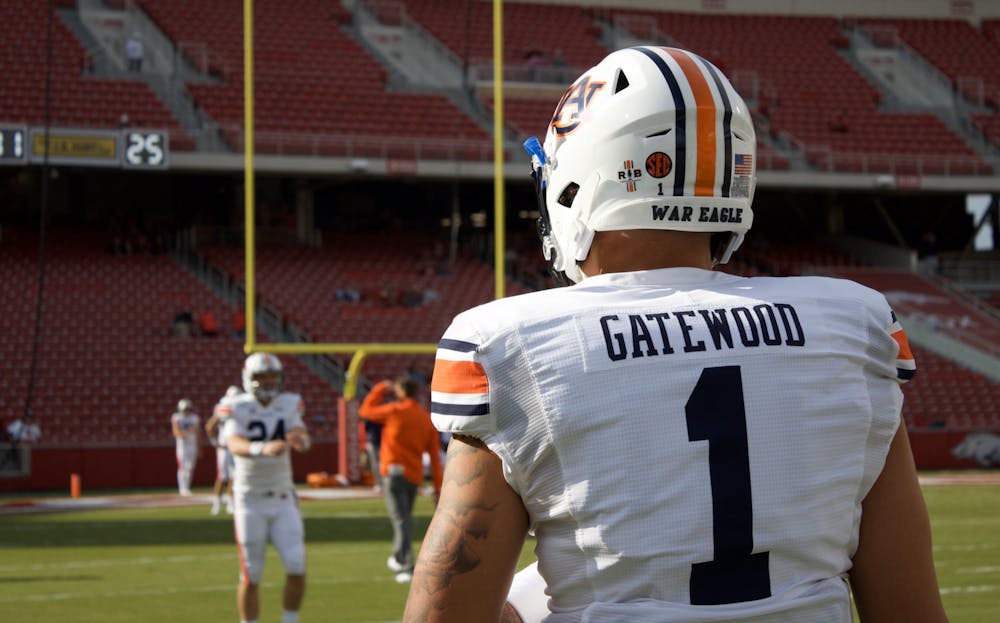 <p>Joey Gatewood (1) warms up before Auburn at Arkansas on Oct. 19, 2019, in Fayetteville, Ark.</p>