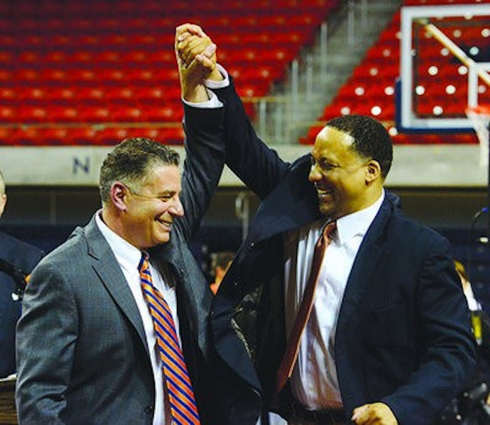 Bruce Pearl (left) introduces longtime assistant Tony Jones (right) as a member of his new coaching staff at Auburn. (Contributed by Lauren Barnard)