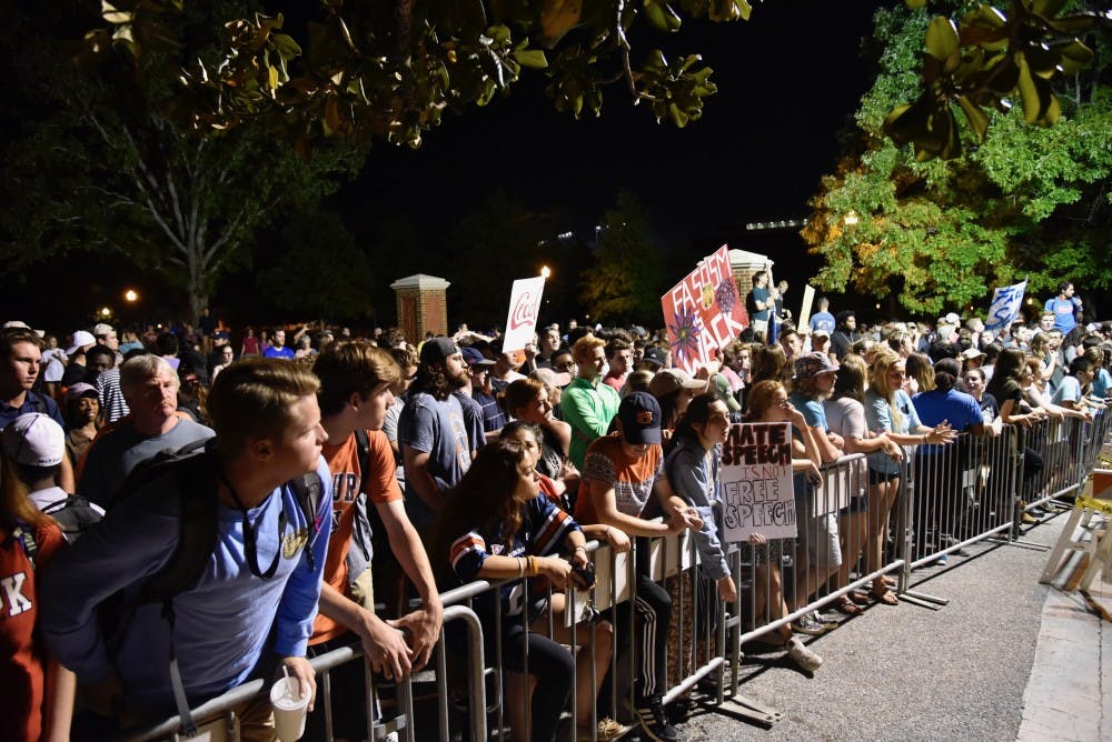 A crowd of students protest on Tuesday, April 18, 2017 in Auburn, Ala.