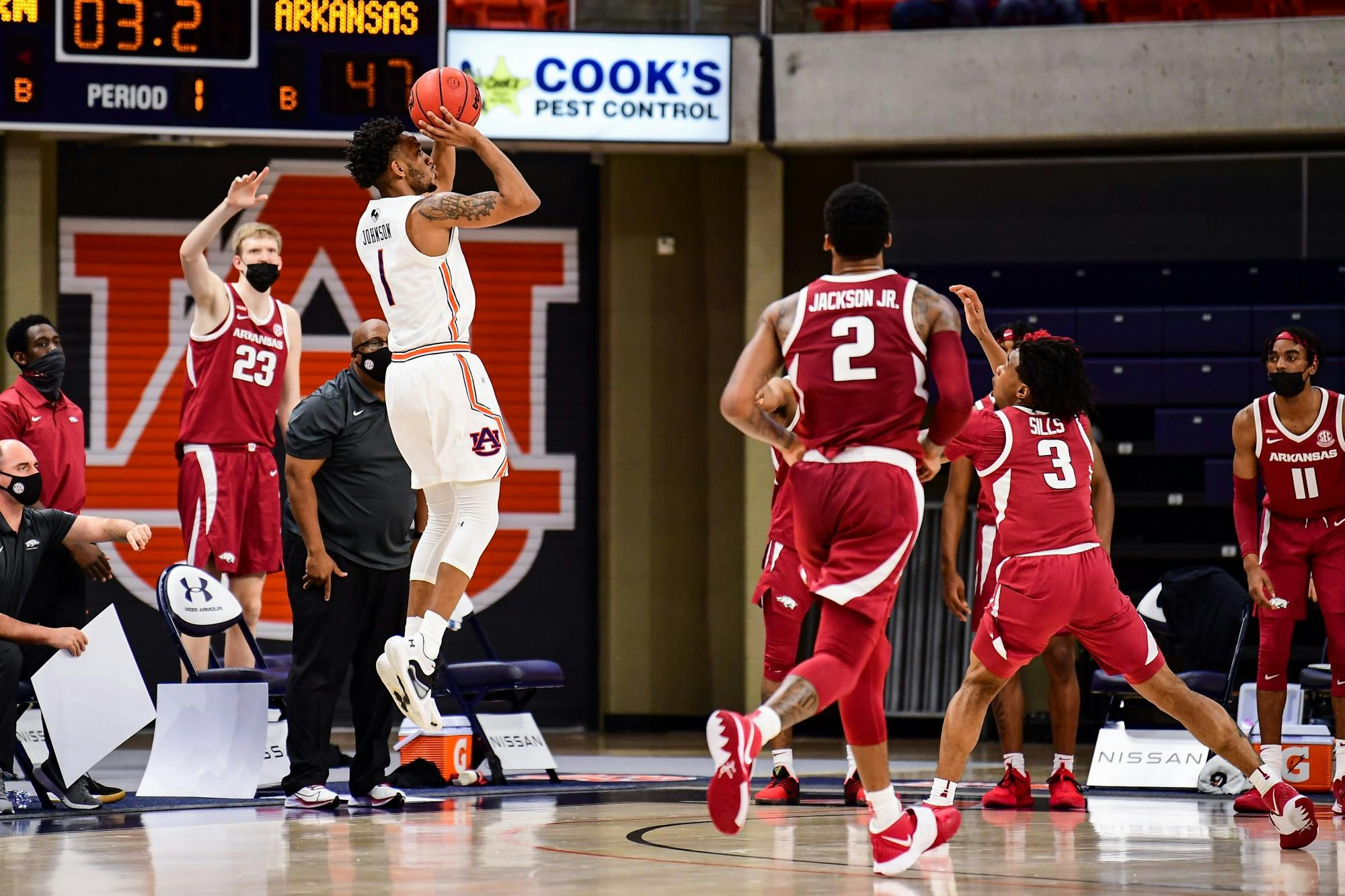 123020_Auburn_SL1_2719_Jamal Johnson shoots a three .jpg